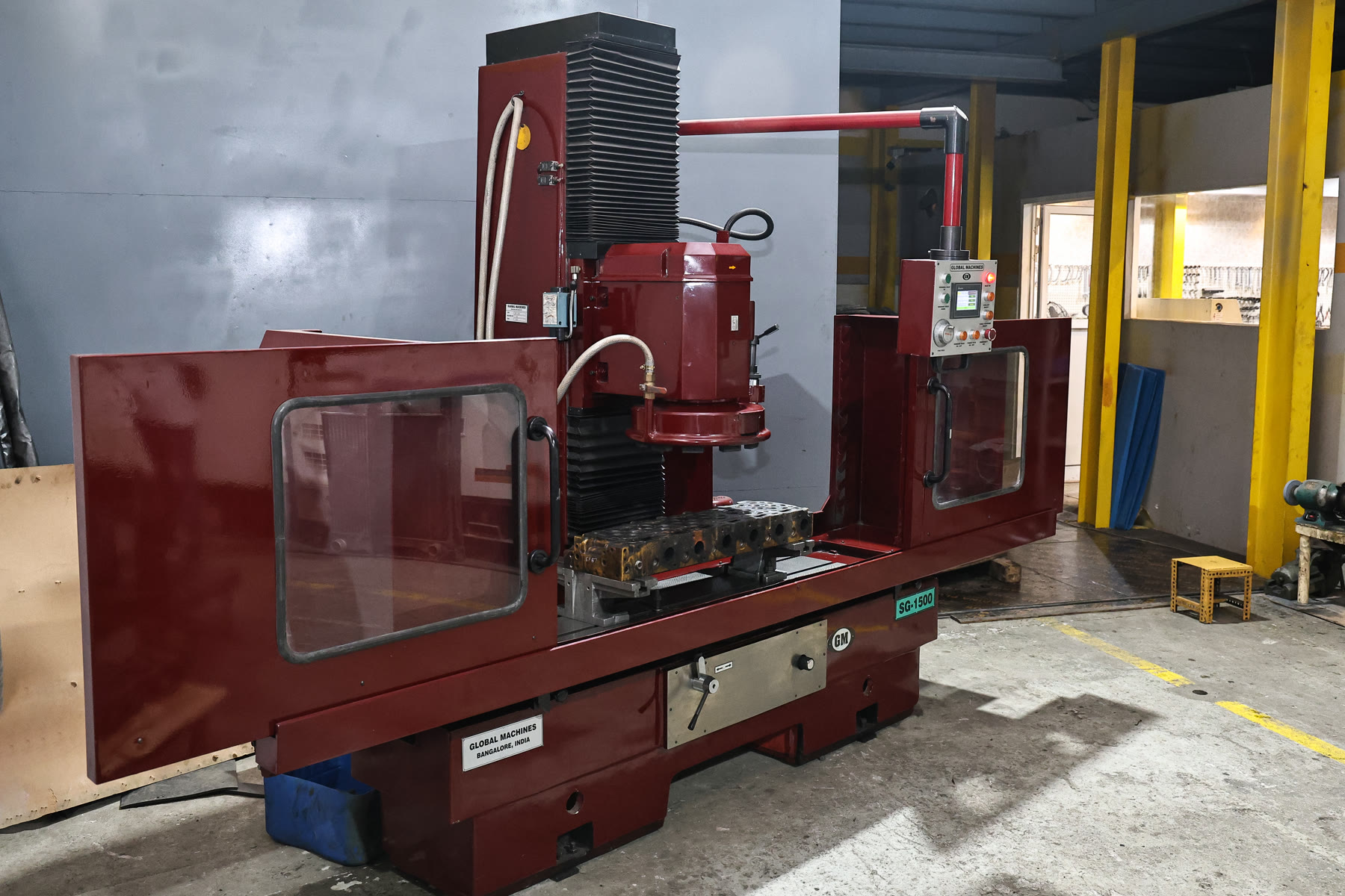 Machining equipment on the Abra Diesel shop floor with engine components staged for work