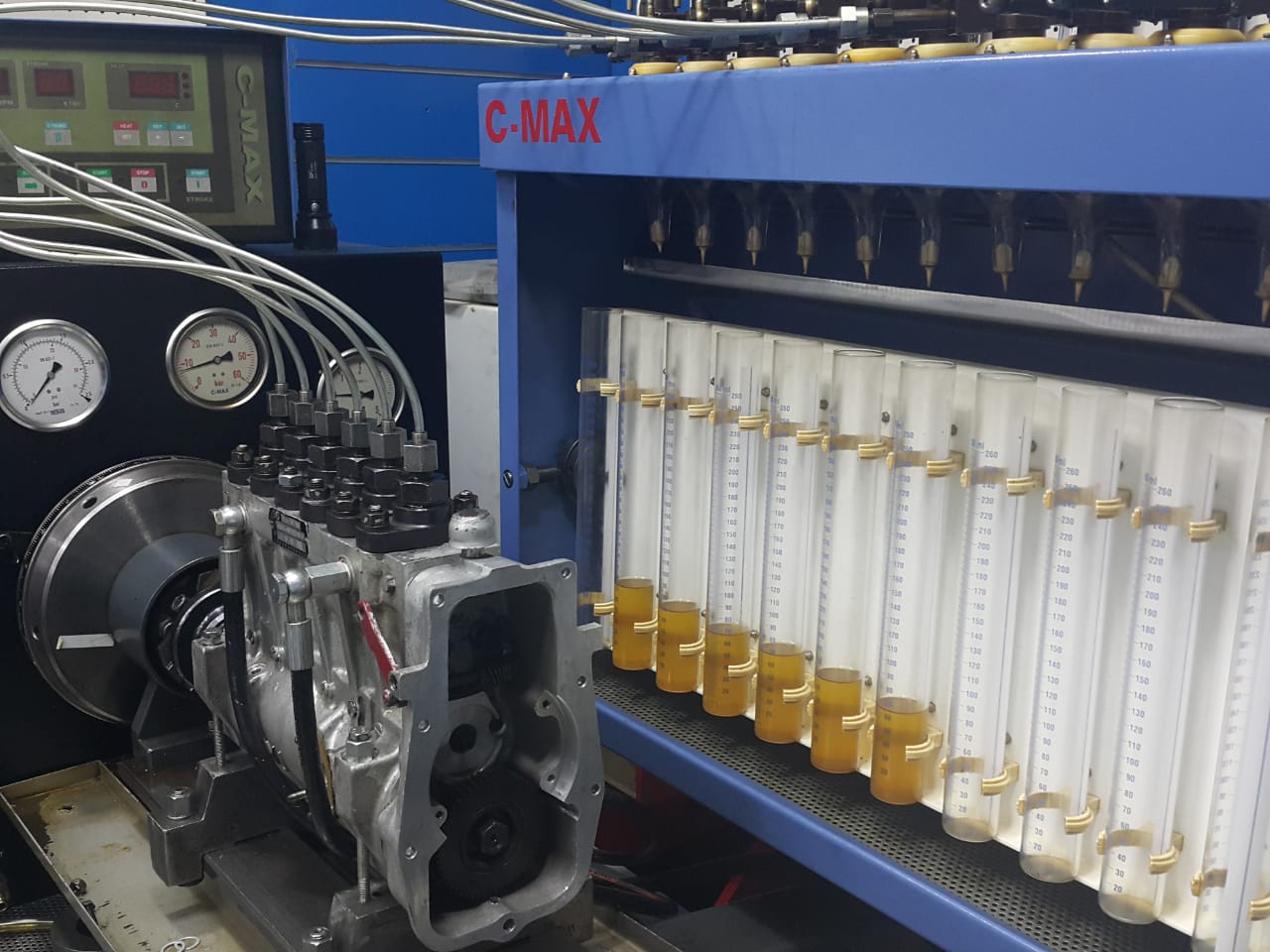 Graduated delivery tubes used to measure injection pump output