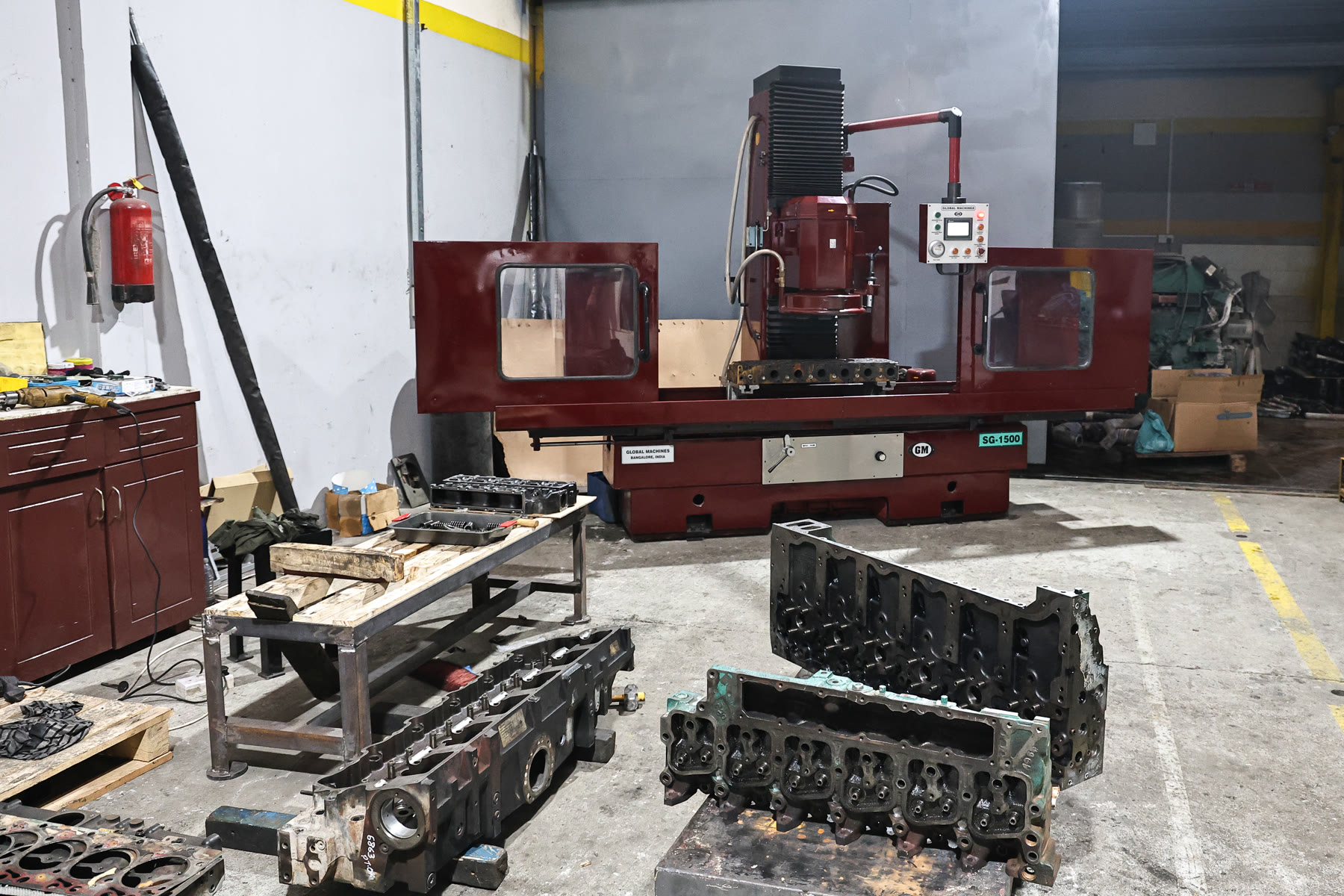 Engine components staged for machining in the Abra Diesel workshop