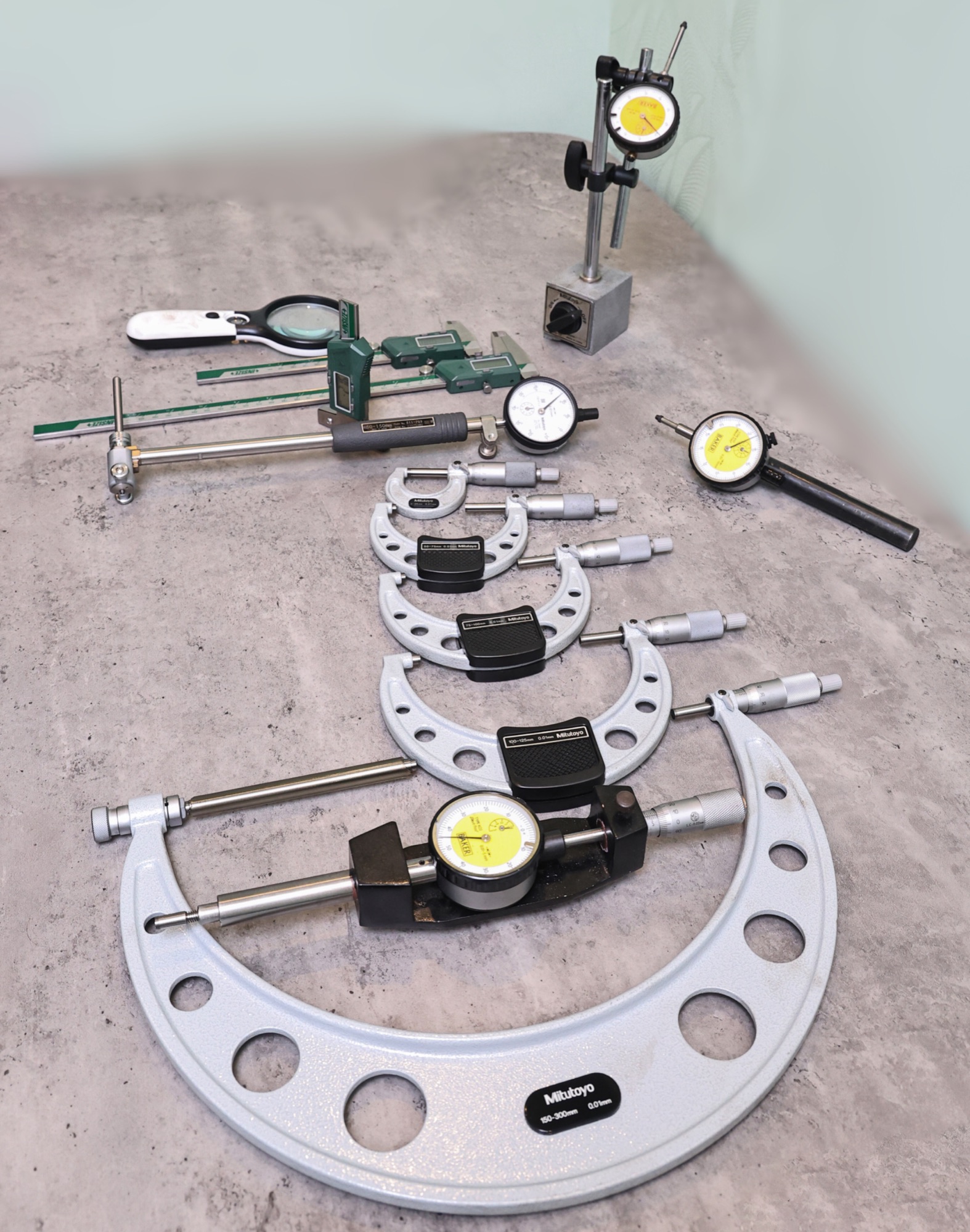 Micrometers and bore gauges used to match pistons and cylinder bores
