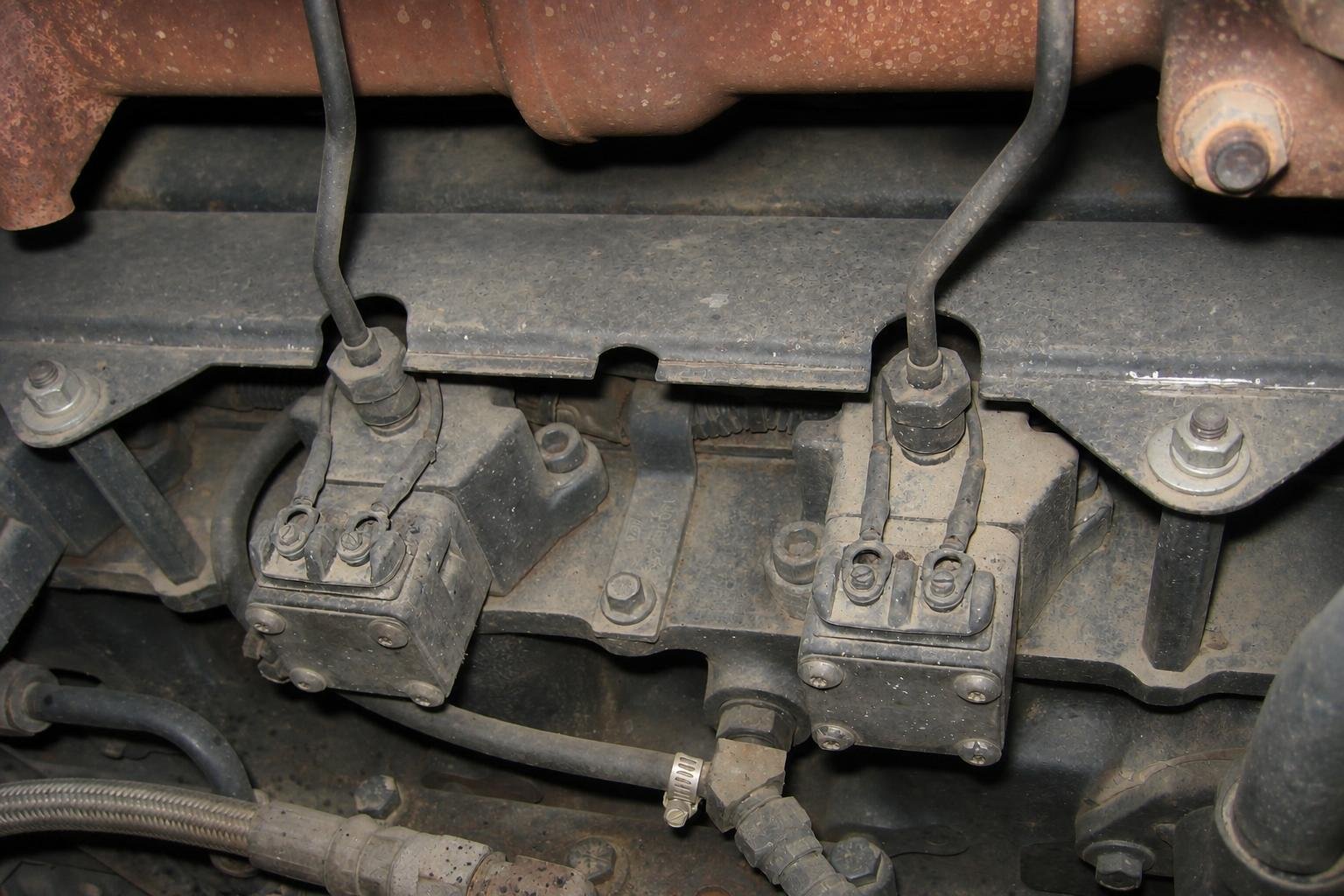 Unit-pump fuel-injection hardware installed on a commercial diesel engine